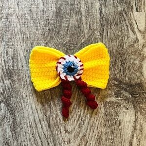 Eyeball bow hair clip handmade crochet yellow